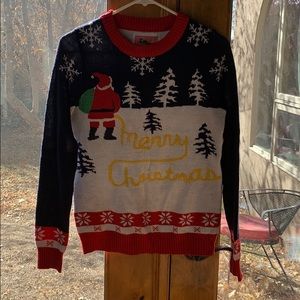 Tipsy elves Santa peeing “Merry Christmas” in snow